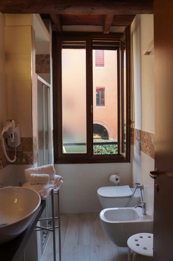 La Scarana Apartment Ferrara Bagian luar foto